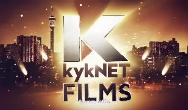 kykNET Films logo over a city skyline at night